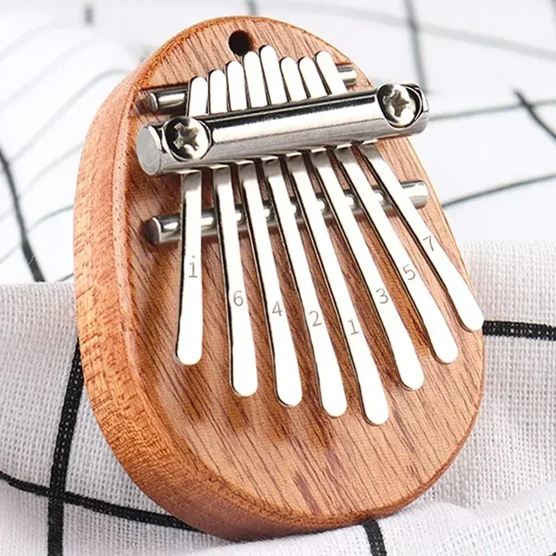 بيانو إصبع خشبي صغير بـ 8 نغما - مراجعة Musical Instrument Kalimba وسعره