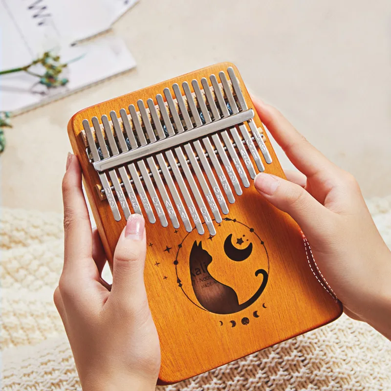 17 مفتاح كاليمبا متدرج اللون ت - مراجعة Musical Instrument Kalimba وسعره